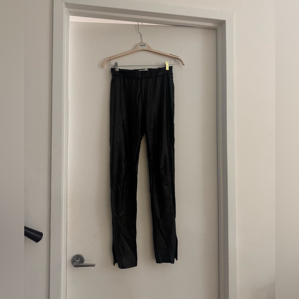 Something Navy women’s leather leggings with zipper ankle detail.